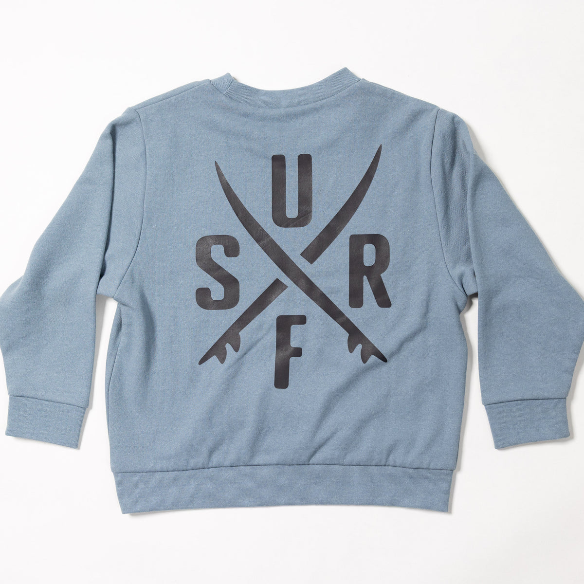 A light blue crewneck sweatshirt shown from the back, featuring a large black graphic of the letters 'SURF' arranged around two crossed surfboards.